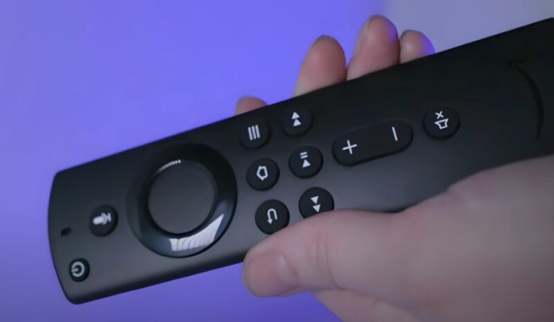 Amazon Fire Stick remote on a purple background